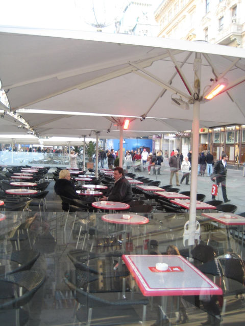 Heliosa 11 under umbrella outdoor cafe